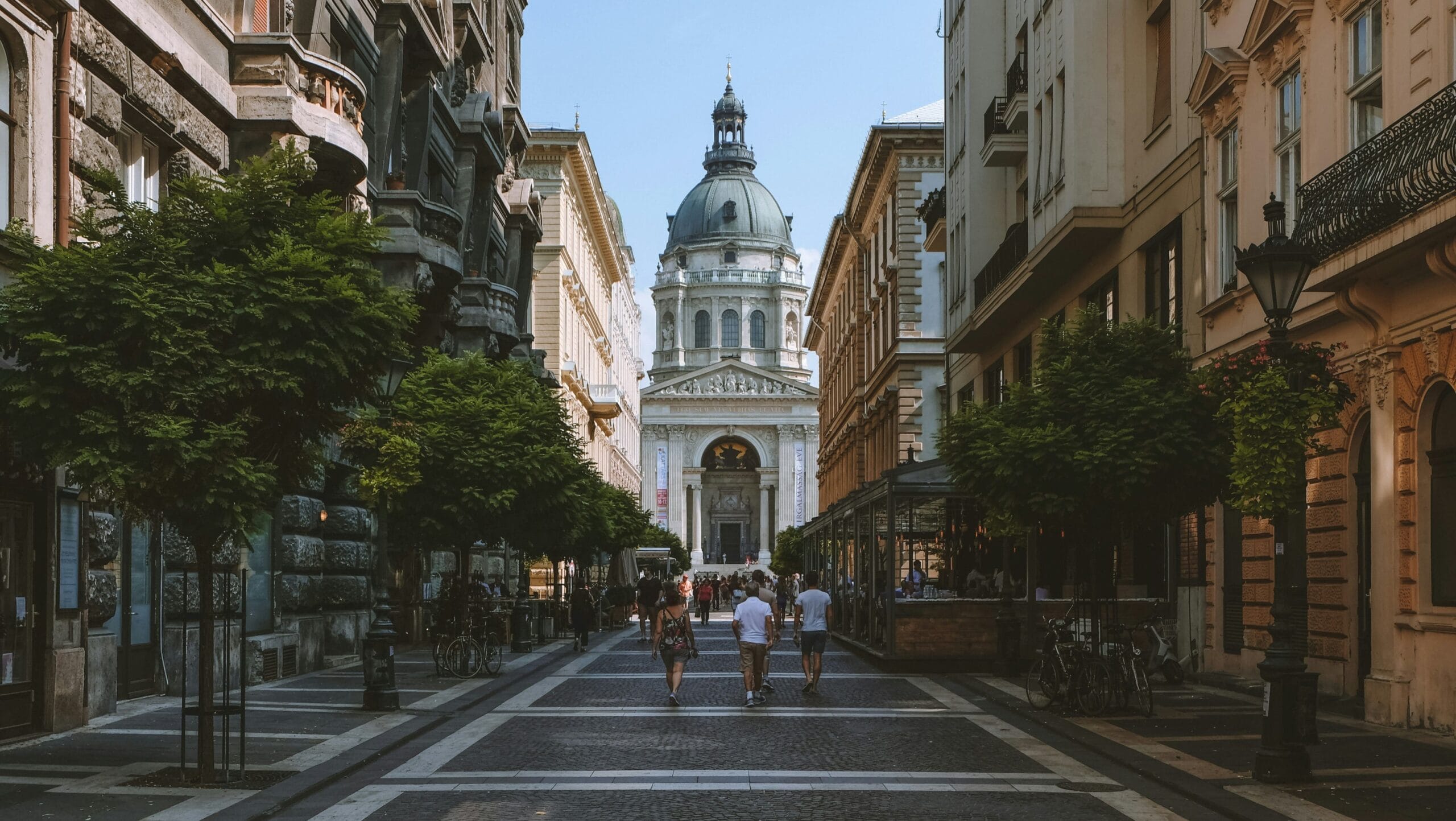 Front view of St. Stephen’s Basilica in Budapest from a cobblestone street