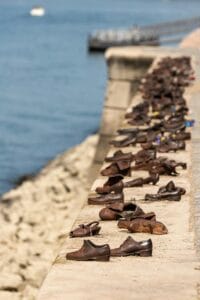 Iron shoes at the Shoes on the Danube memorial along the Danube riverbank in Budapest